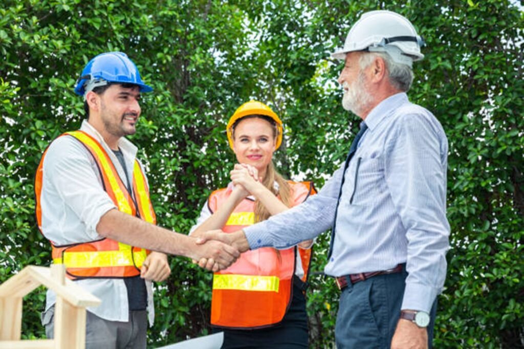 Professional tree service team discussing project details with homeowner after tree trimming job in Bay Village, OH